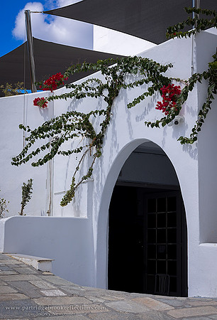 240916FloweredEntranceSantoriniPalaceHotelSantoriniGr